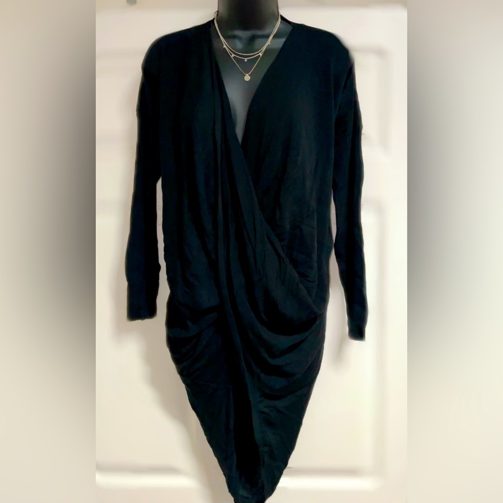 Women’s sexy long sleeve black cross over front tunic.  Size S. NWT
